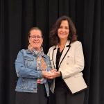 Rochester (left) with Jeri Beggs, FAR at Illinois State, who presented the award.