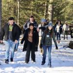 NMU students and Detroit Outdoors participants on a hike at Presque Isle Park