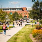 Students walking on campus (NMU stock photo)