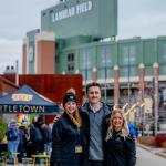 Corgan (center) outside Lambeau Field