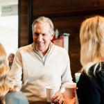 Schultz interacting with students in the campus Starbucks during his October visit