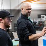 NMU Engineering Technology Professor Cale Polkinghorne with a student