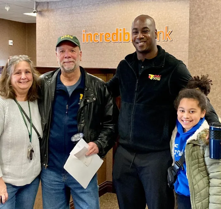(From left): Lenette and Mark Pynnonen with Keven Hagans and his daughter